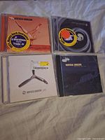 Front covers of four Vertical Horizon CDs