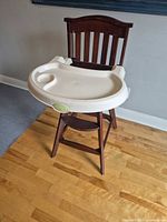 Front view of high chair with tray attached