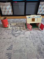 overview of barn, silo, fences, trough