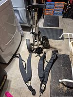 Full view of golf cart frame, wheels and straps