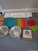 full lot showing buckets, silicone molds, caddy, basket, tin