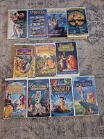 All eleven VHS tapes laid out to show front covers