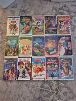 All 15 VHS tapes laid out in 3×5 grid