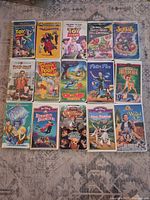 All 15 VHS tapes laid out in three rows