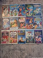 All 15 VHS tapes laid out in three rows for overview