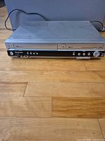 Front view of Panasonic DMR-ES35V combo unit showing overall condition