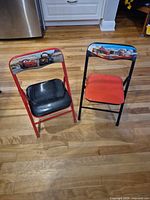 Both Disney Cars kids folding chairs side by side