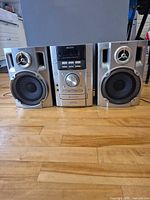 Front view of Sony receiver flanked by both speakers