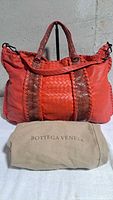 Front view of tote with dust bag