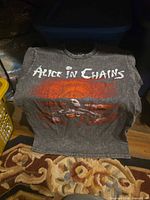 Front view showing Alice in Chains graphic and sleeveless cut