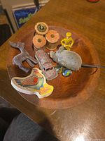 Overall view of wooden bowl and all small vintage items