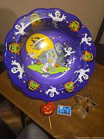 Overall lot including bowl, cookie cutter, pick and sticker