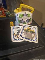 Entire lot showing teapot planter, both thimbles, both pins on cards