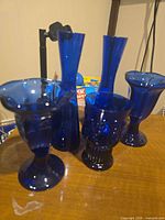 Group shot of all five cobalt blue glass pieces