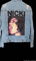 Back view showing large Nicki Minaj portrait graphic and NICKI lettering, distressing on shoulders