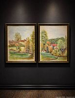 Both framed watercolor paintings side by side