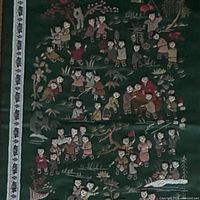 Full view of vintage green silk tapestry with numerous children figures