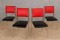 All four chrome dining chairs front view
