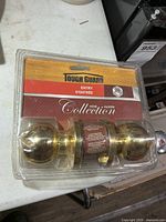 Front view of sealed Touch Guard brass entry door knob set