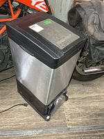 Full view of stainless Euro-Pro X vacuum showing power cord and front suction slot