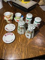 Entire lot showing shakers, egg cups, plates