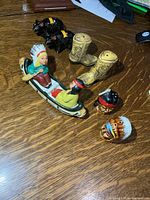 All four salt and pepper shaker sets displayed on table