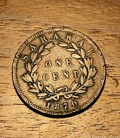 Reverse side wreath design with ONE CENT and 1870 date