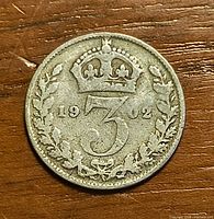 Reverse showing crowned numeral 3, wreath, date 1902