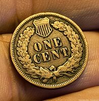 Reverse of 1903 Indian Head cent showing wreath and ONE CENT text