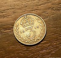 Reverse side with crowned numeral 3 and 1915 date