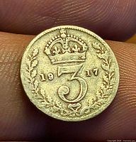 Reverse side displaying crowned 3, wreath, and 1917 date