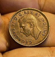 Obverse of 1940 Canada 1 cent coin showing King George VI portrait and legend