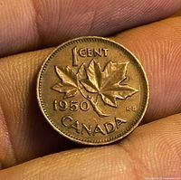 Obverse showing maple leaf design, date 1950, denomination 1 CENT, country CANADA, designer initials KG