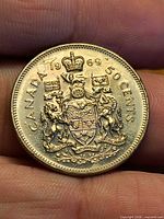 Reverse showing Canadian coat of arms and date 1969