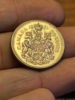 Obverse showing CANADA 1971 50 CENTS and Coat of Arms design