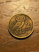 Reverse side showing owl and denomination 2 ΔΡΑΧΜΑΙ