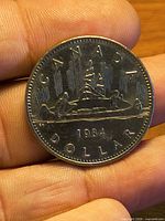 Obverse side showing CANADA DOLLAR 1984 Voyageur design