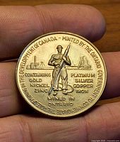 Obverse showing composition text and miner design