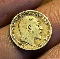 Obverse showing Edward VII right‐facing portrait and legend