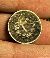 Reverse showing large V and wreath