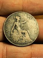 Reverse view showing seated Britannia and 1912 date