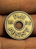 Reverse showing FIJI 1936 PENNY around central hole
