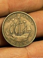 Reverse of 1939 half penny showing ship design and date