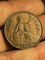 Reverse side showing seated Britannia with ONE PENNY and date 1945
