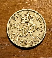 Reverse side showing 1949 date, crowned GR monogram, denomination