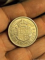 Reverse of 1953 half crown coin showing crowned shield and denomination