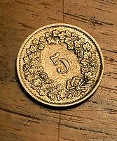 Reverse side showing numeral 5 and oak leaf wreath