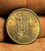 Reverse of 1964 one shilling showing crowned Scottish lion shield and date