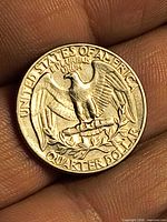 Reverse of 1966 Washington Quarter showing eagle and legends