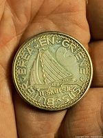 Obverse with Skûtsje sailboat and Frisian motto